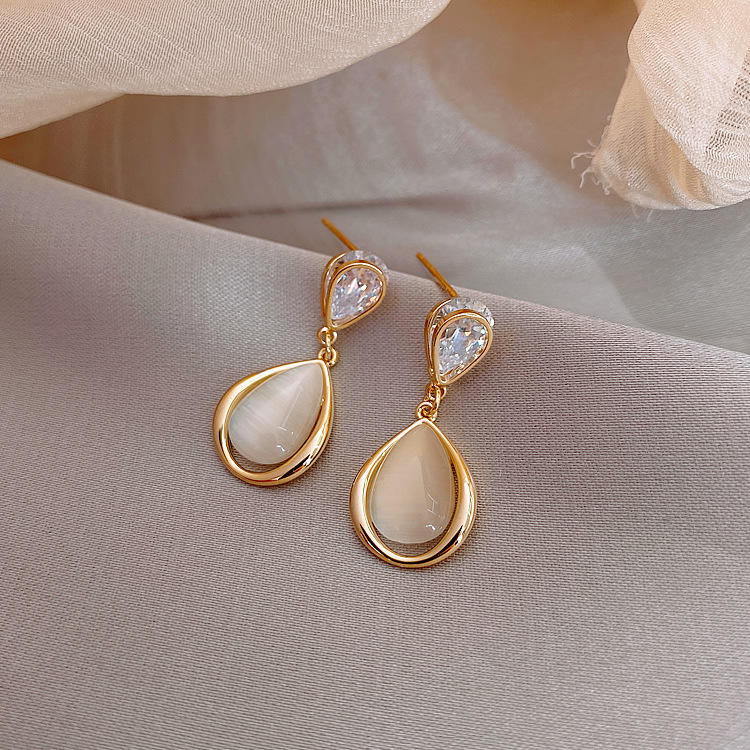 Pearl drop earrings for womenMaterial:- Pearl + Stones + AlloyColor:- Gold