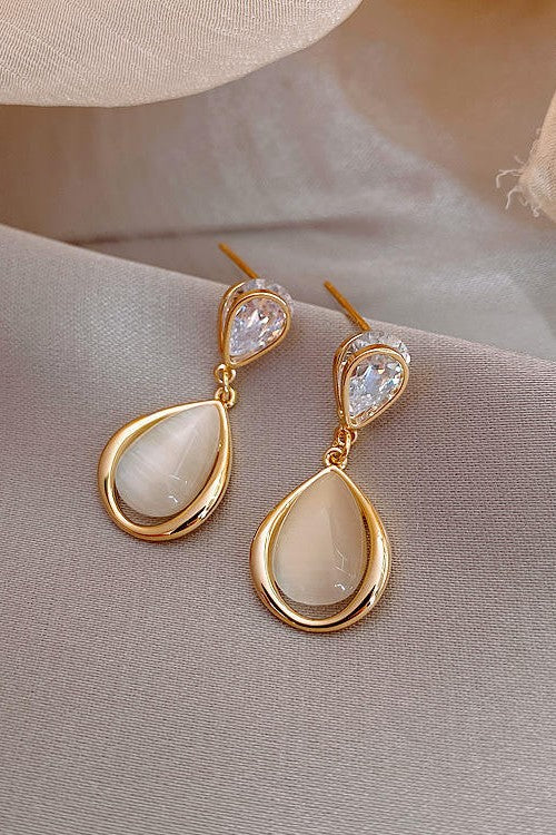 Pearl drop earrings for womenMaterial:- Pearl + Stones + AlloyColor:- Gold