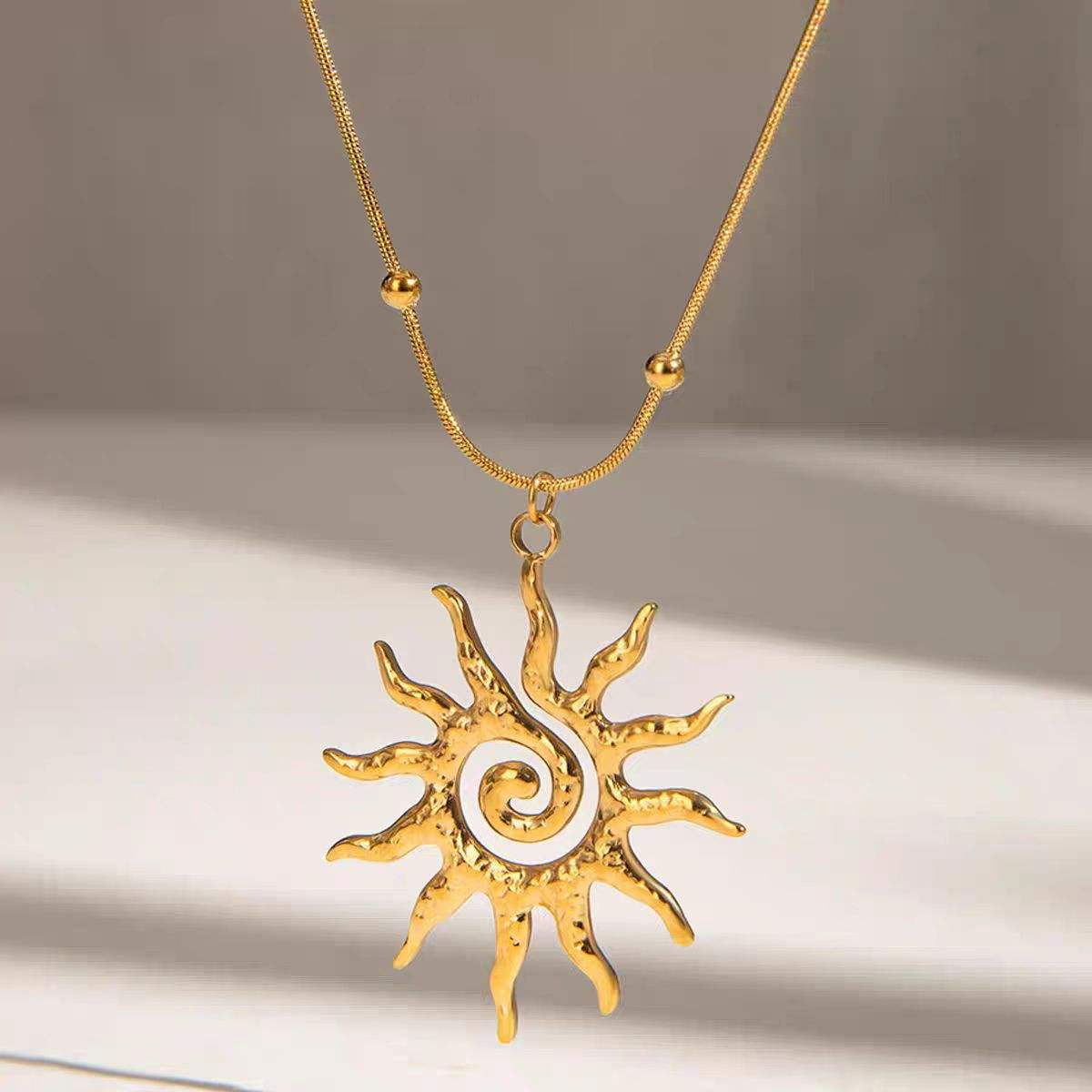 Stainless steel  sun shaped Necklace for women Colour:- Gold Anti Tarnish and Anti Allergic 18 k gold plated