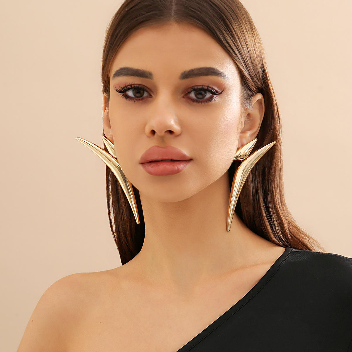 Triangle shape oversized big earrings for women Colour:- GoldMaterial:- Zinc Electroplating