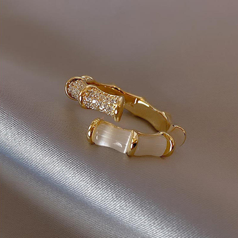 Party wear Adjustable Finger ring for womenMaterial:- Zircon and AlloyColour:- Gold