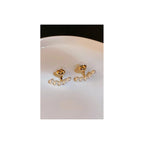 Pearl ear studs