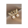 Swan stud earrings for womenMaterial:- Alloy zinc, pearl and zirconColor :- Gold