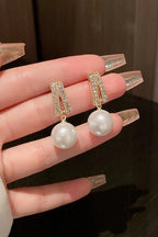 Pearl earrings for women Color :- Same as photo Material:- Alloy copper