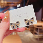 Bow shaped ear studs for women