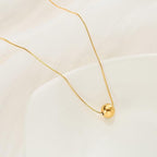 Classic simple ball pendant necklaceMaterial:- Alloy coperColor :- Gold