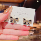 Bow shaped ear studs for women