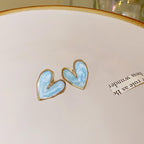 Heart shape Studs for womenAnti tarnish materialColour:- Blue and purpleMaterial:- Alloy Zinc
