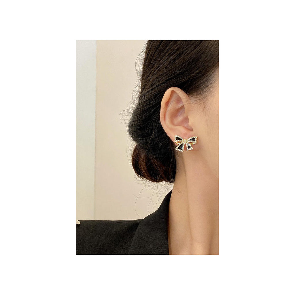 Bow shaped ear studs for women