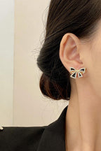 Bow shaped ear studs for women