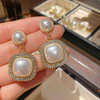 Korean Pearl Rhinestones Earrings for womenMaterial:- Rhinestones+ Pearl + AlloyColor:- Gold