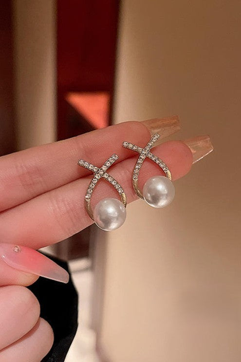 Party wear Pearl Rhinestones ear studs Material:- Pearl and zircon+ AlloyColour:- Gold