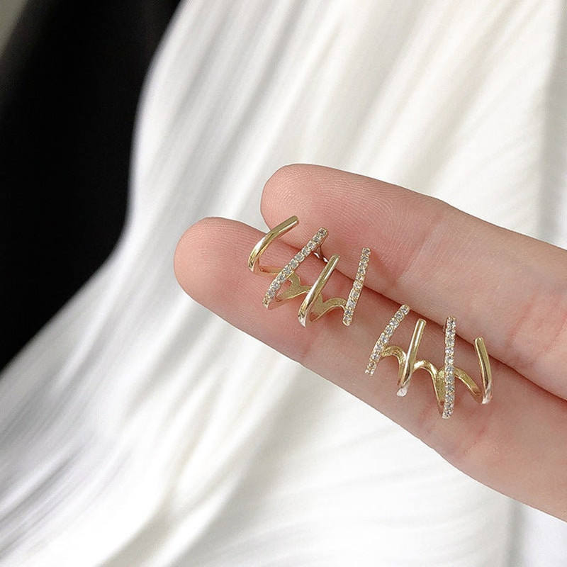 Claw studs for women