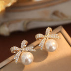 Women's Bow and Pearl Combination Ear studsMaterial:- Pearl + AlloyColor:- Gold