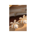 Women's Bow and Pearl Combination Ear studsMaterial:- Pearl + AlloyColor:- Gold