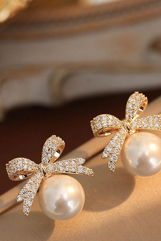 Women's Bow and Pearl Combination Ear studsMaterial:- Pearl + AlloyColor:- Gold