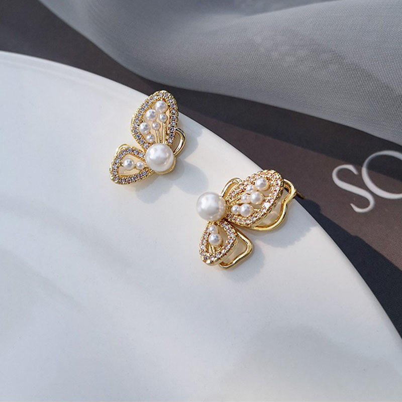 Butterfly ear studs