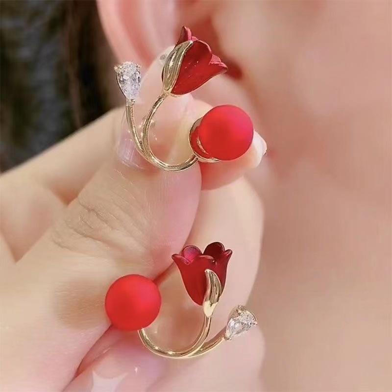 Flower Ear studs for women Material:- Alloy Copper Color:- RedAnti tarnish studs