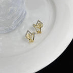 Water drop Ear Studs for WomenMaterial:- Alloy zinc + StonesColour:- Gold