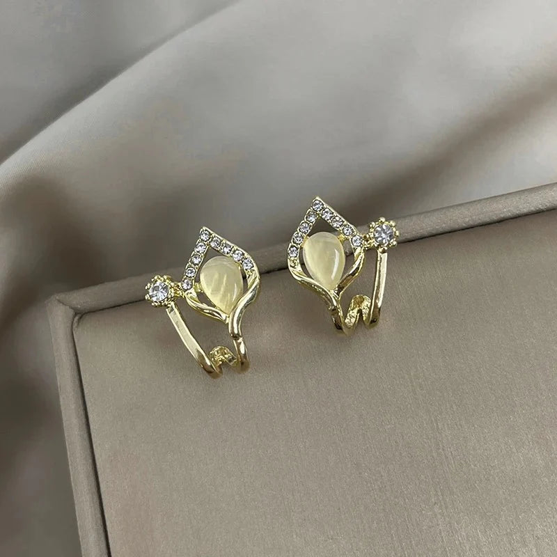 Water drop Ear Studs for WomenMaterial:- Alloy zinc + StonesColour:- Gold