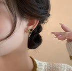 Butterfly ear studs for women