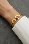 Elegant Gold-Tone Circle Link Bracelet With Black Enamel Accent