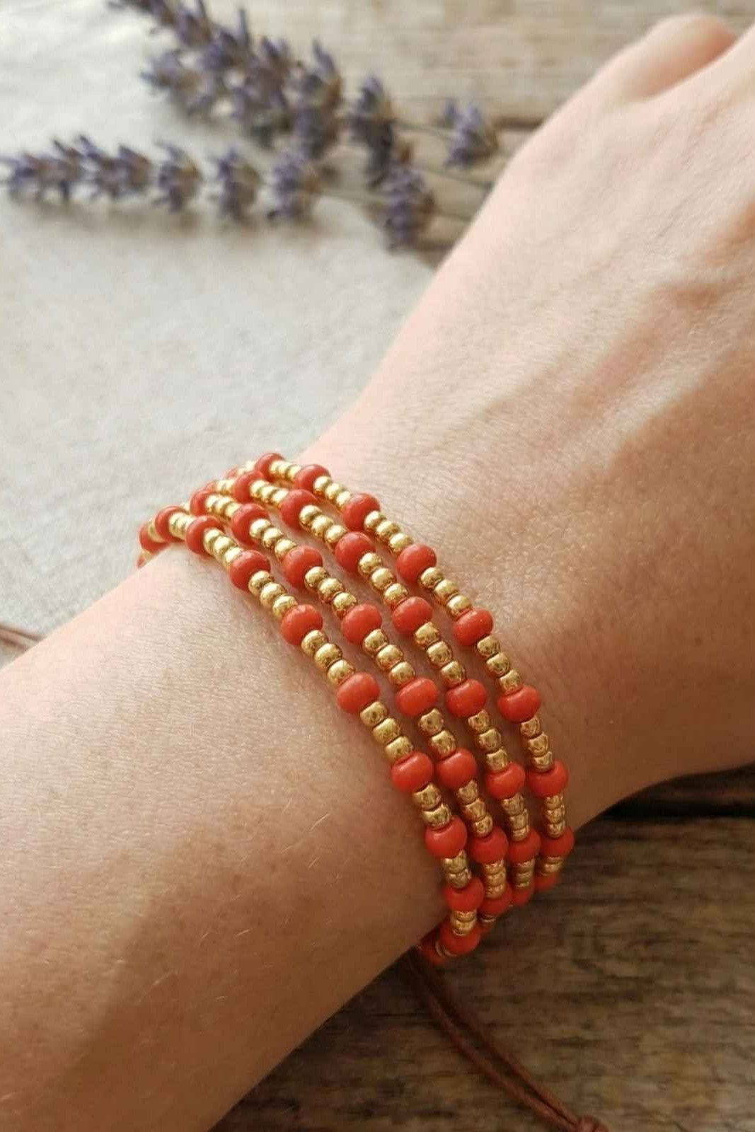 Vibrant Multi-Strand Red and Gold Beaded Adjustable Bracelet