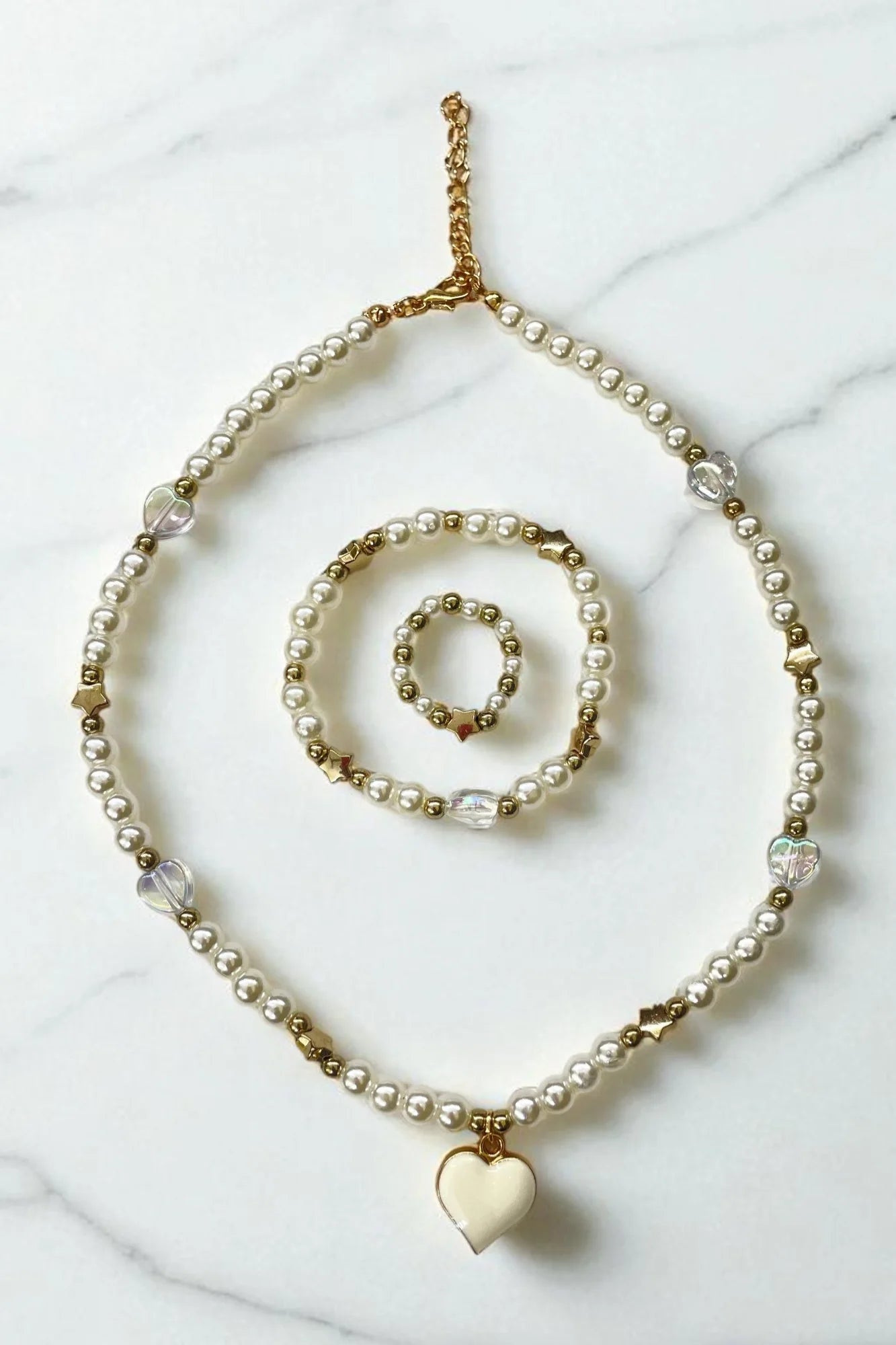 OMID, Elegant Pearl Jewelry Set for Women - Necklace, Bracelet, and Ring with Heart Pendant – Gold-Toned Alloy & Faux Pearl Beads