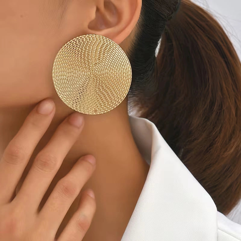 Round shape oversized Earrings Colour:- Gold Material:- Zinc and Electroplating Size :- 6 cm Premium Quality