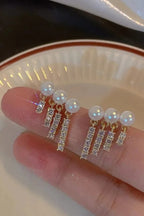 Women pearl Rhinestones tassel EarringsMaterial:- Pearl + Stones + AlloyColour:- Gold