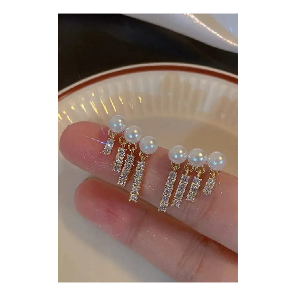 Women pearl Rhinestones tassel EarringsMaterial:- Pearl + Stones + AlloyColour:- Gold