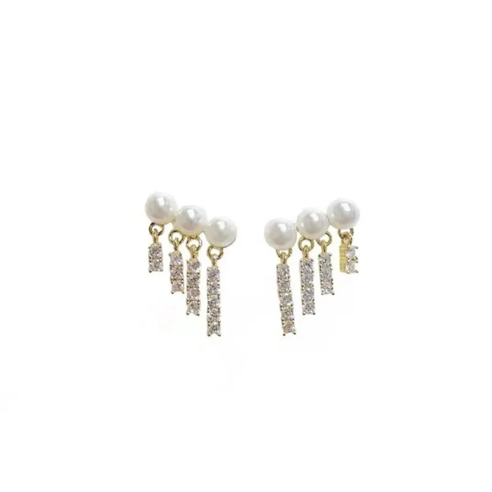 Women pearl Rhinestones tassel EarringsMaterial:- Pearl + Stones + AlloyColour:- Gold