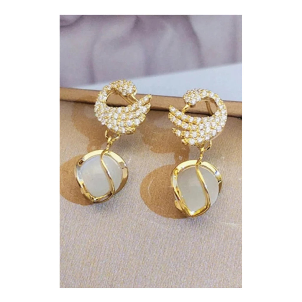 Swan Shape Fashionable earrings Color :- Gold Material  :- Stones and Zircon Alloy