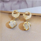 Swan Shape Fashionable earrings Color :- Gold Material  :- Stones and Zircon Alloy